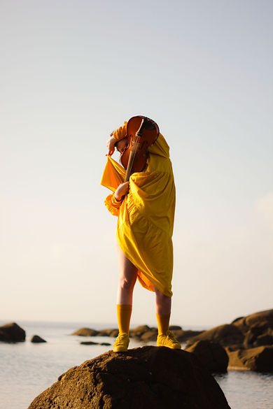 Clare Sands Yellow Portrait.jpg